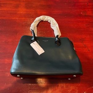Nuevo! Vendo esta hermosa bolsa de David Jones Paris de color pavo real azul.